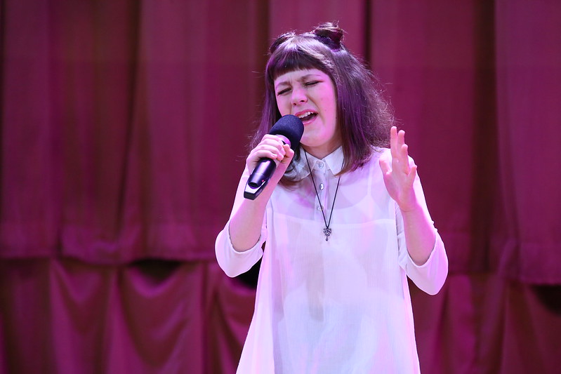 an image of Margaret Bieliaieva performing on stage